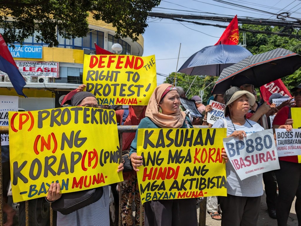 Group rallies against charges filed over Labor Day protest